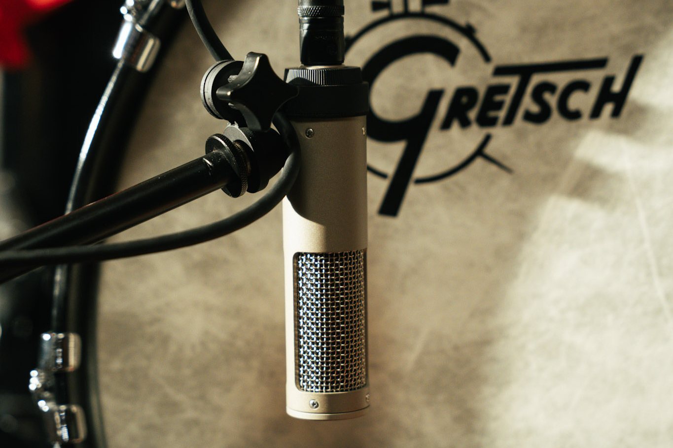 Royer R-10 ribbon microphone hung in front of the Gretsch kick drum resonant head