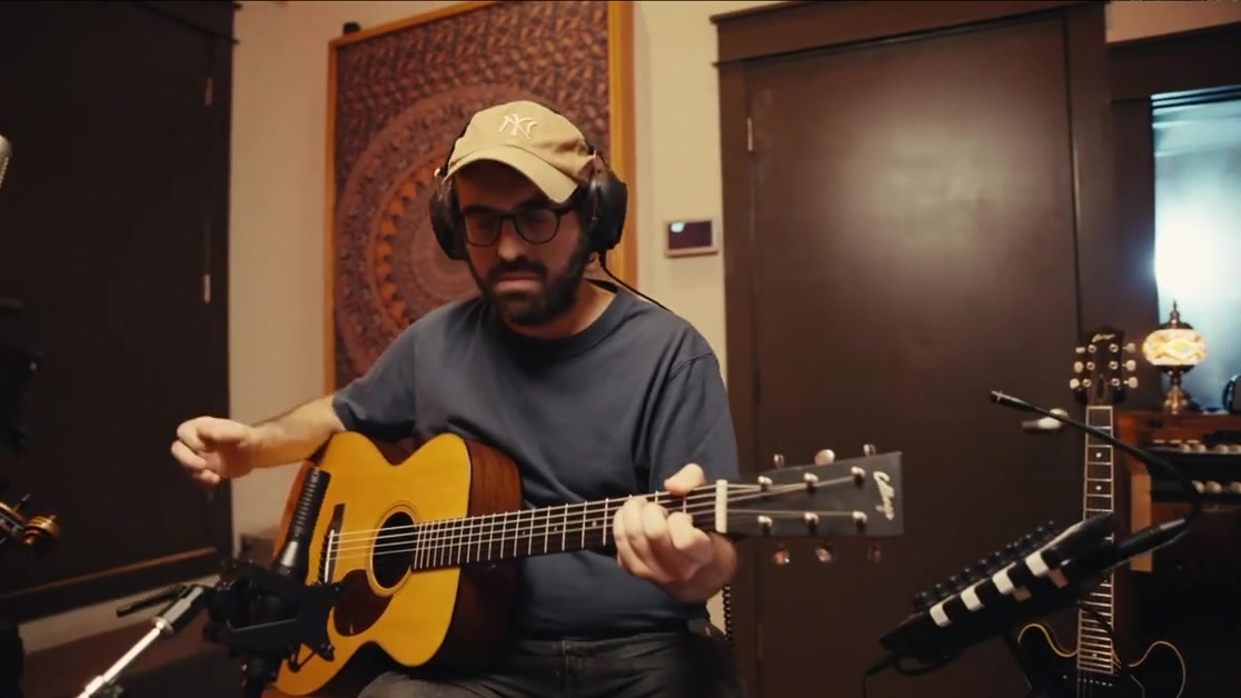 Anthony Da Costa playing steel-string acoustic guitar into a Royer SF-2 active ribbon microphone
