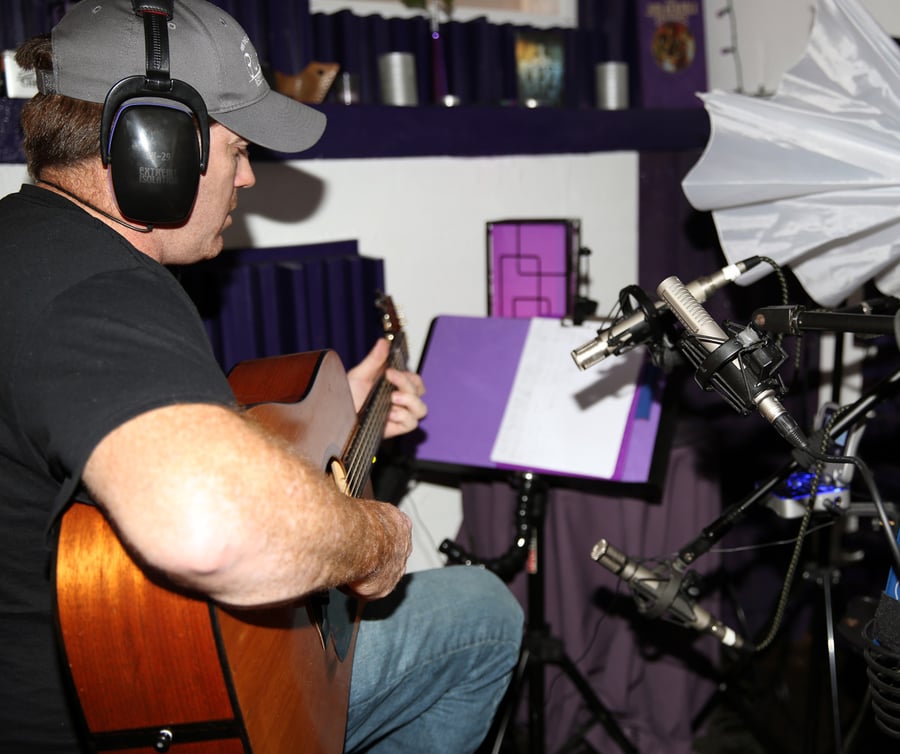 Acoustic guitar miked with one R-121 and a pair of small diaphragm condensers