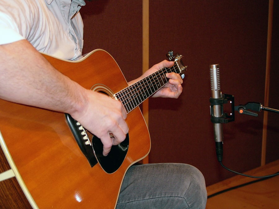 Acoustic guitar miked with a single backward R-122 MKII at the 12th fret
