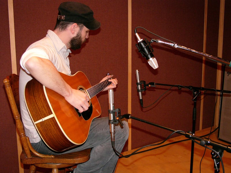 Wide spaced R-122s with a large diaphragm condenser where the neck meets the body, alternate view