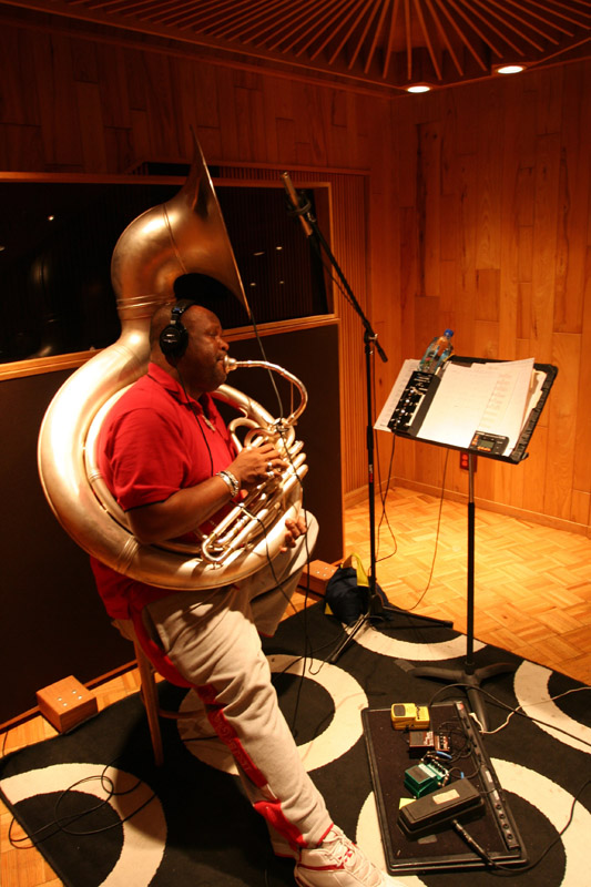 Dirty Dozen Brass Band tuba player recording with an R-122 ribbon mic